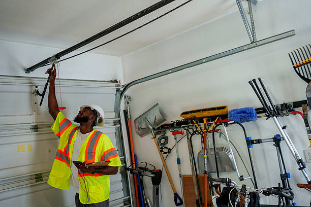 Professional Garage Door Panel Replacement technician working in Helena, OK